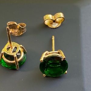 Emerald green earrings.